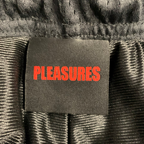 Shorts PLEASURES taille M noir orange en maille polyester avec taille élastique