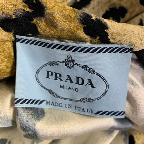 PRADA Robe longue beige et noire en viscose à drapé asymétrique, taille 38