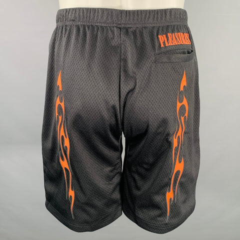 Shorts PLEASURES taille M noir orange en maille polyester avec taille élastique