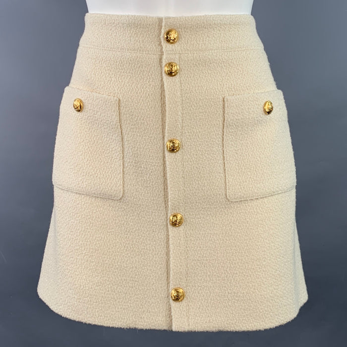 CELINE Size 8 Cream Wool Blend Boucle Two Pockets Snaps Mini Skirt