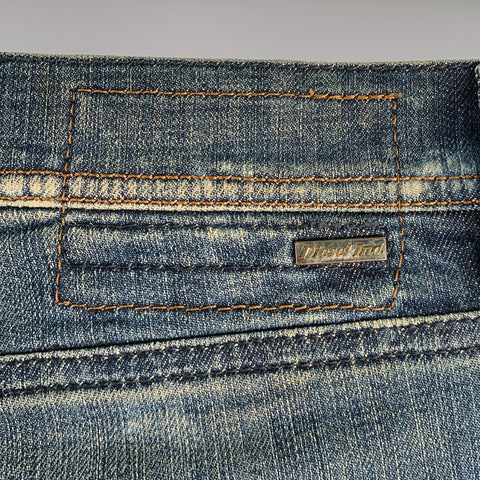 DIESEL Size 26 Tepphar Blue Cotton Blend Tapered Slim Distressed Jeans
