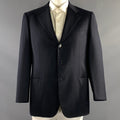 Front view of navy Brioni sport coat on mannequin with notch lapels, three-button front, chest pocket, and flap hip pockets.