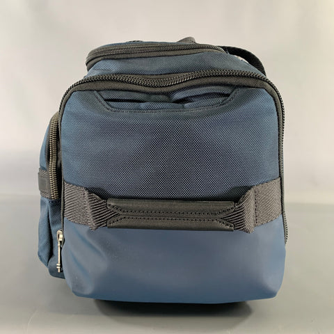 Sacs polochons en toile chinée noire bleu marine TUMI