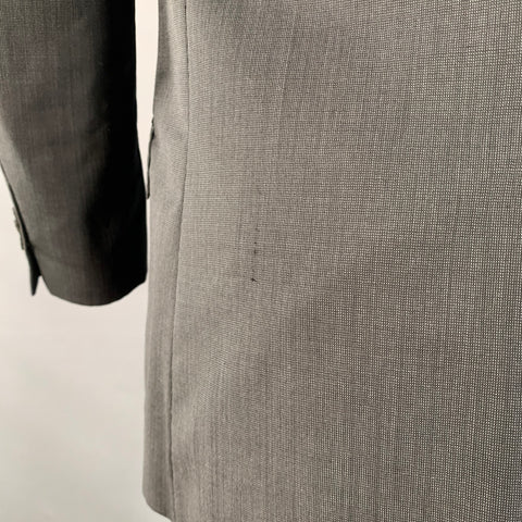 Costume J. LINDEBERG taille 40 coupe classique noir gris en laine, revers en pointe, un bouton