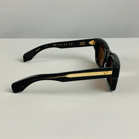 JACQUES MARIE MAGE Lunettes de soleil en acétate à rayures noires et dorées