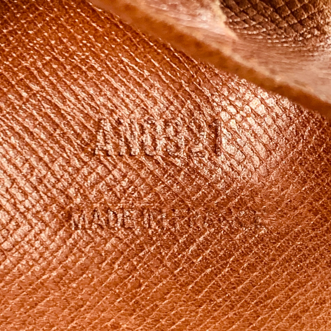 LOUIS VUITTON Brown Brass Monogram Coated Canvas Wallet