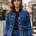 Blue textured jacket on a mannequin against a gray background