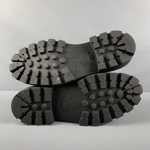 TOD'S Talla 11.5 Mocasines con suela deportiva de cuero macizo negro