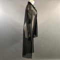 Side view of black sheer mesh long-sleeve tunic shirt on a mannequin.
