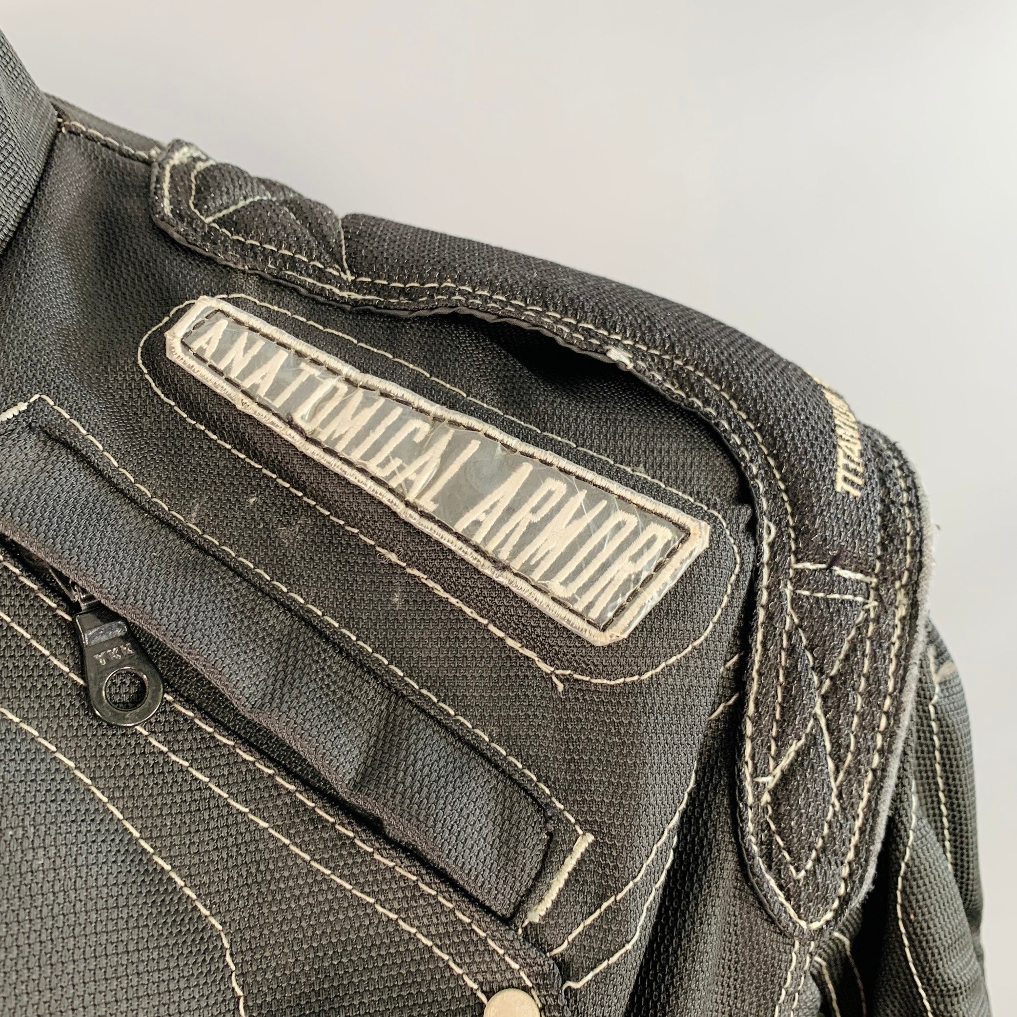 ICON Size L TiMAX Black Silver Nylon Motorcycle Jacket – Sui