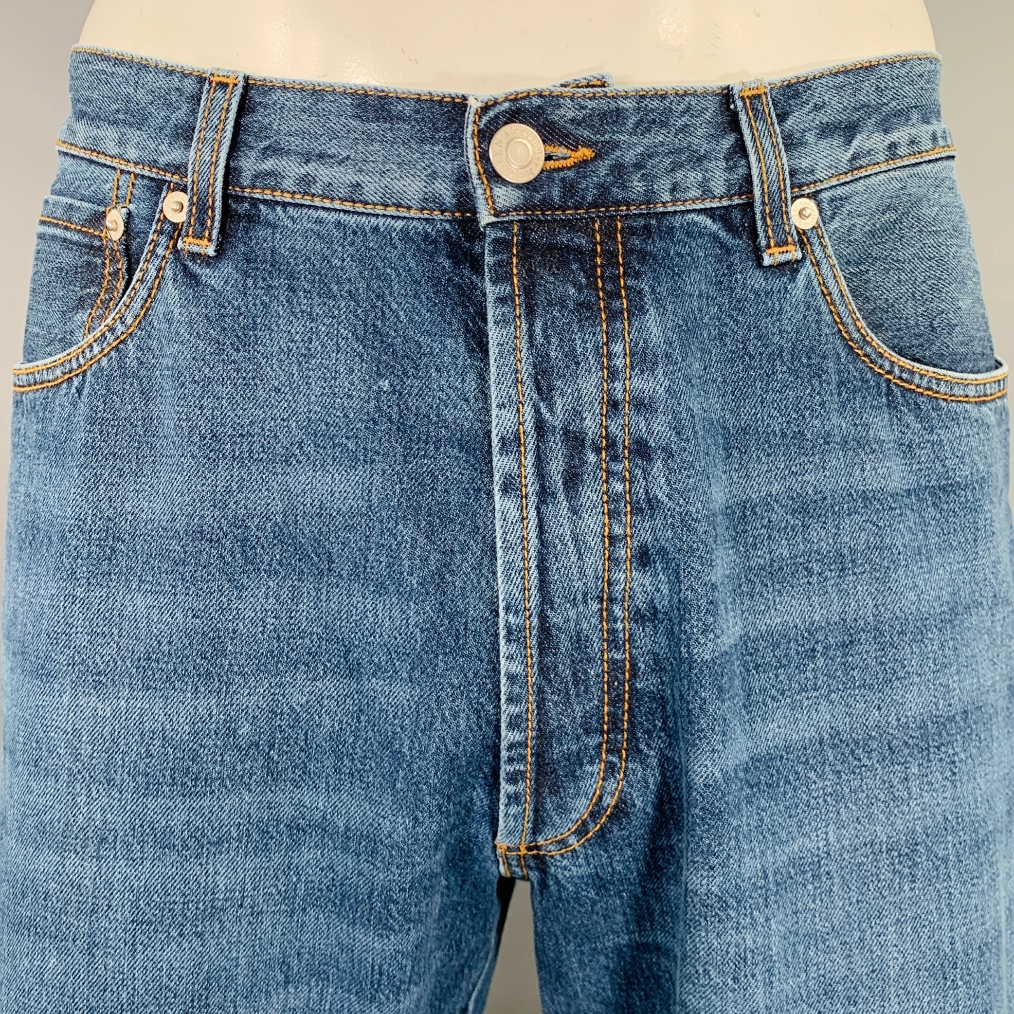 デニム・ジーパン Alexander Mcqueen Denim Jeans Alexander McQueen McQueen Graffiti Denim Jeans | Blue | FARFETCH