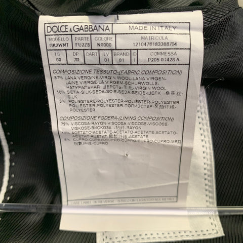 DOLCE & GABBANA Smoking noir en laine vierge et soie mélangées, revers en pointe, taille 48
