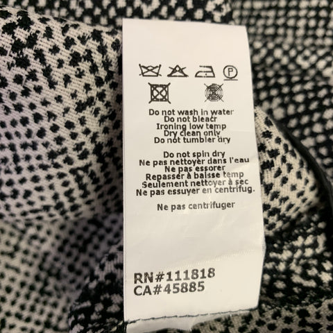 Pantalon habillé MICHAEL KORS COLLECTION taille 0, en tweed de laine noir et blanc, avec fermeture éclair latérale.