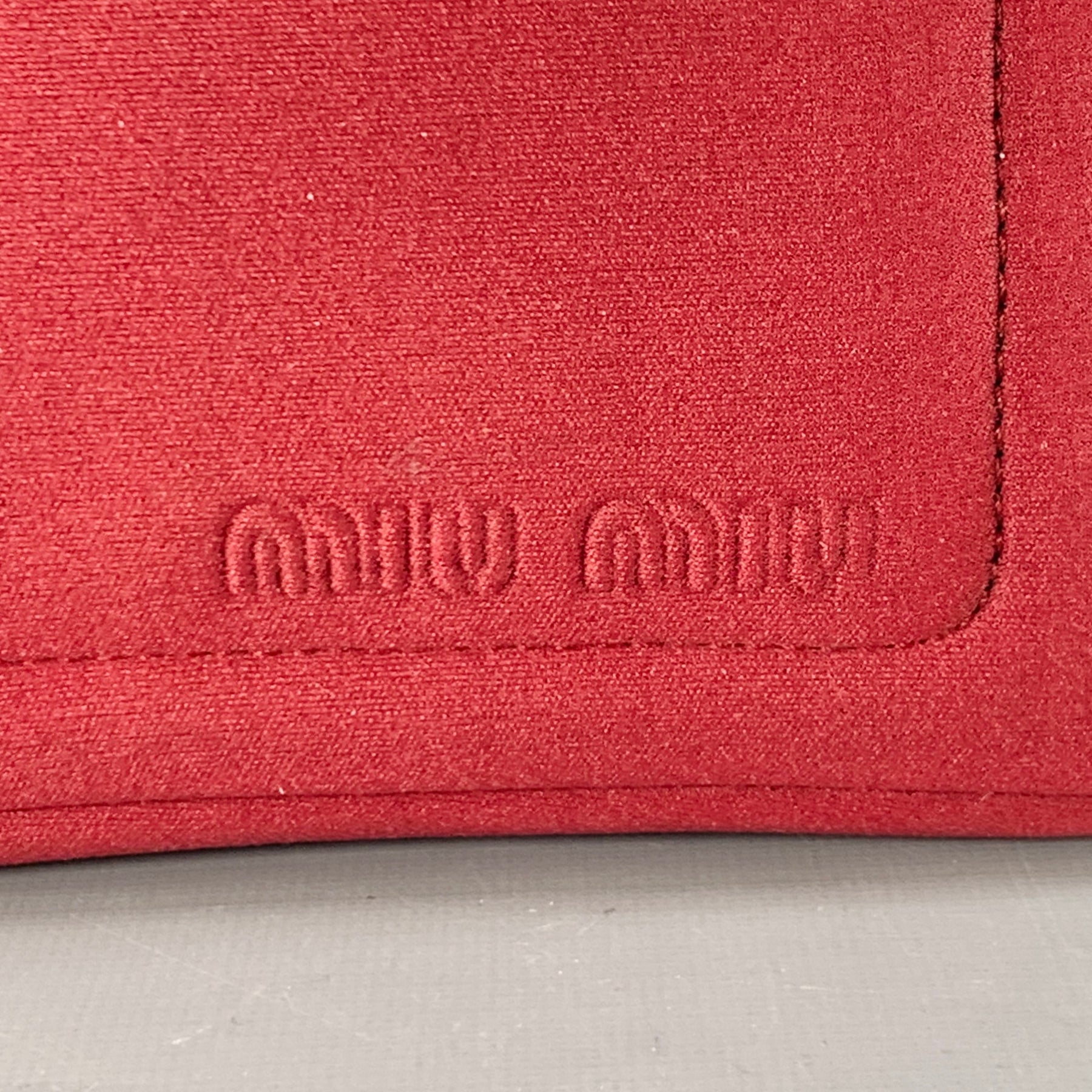 Sui Generis archive reference: Miu Miu burgundy and black nylon shoulder bag, SKU 139716.