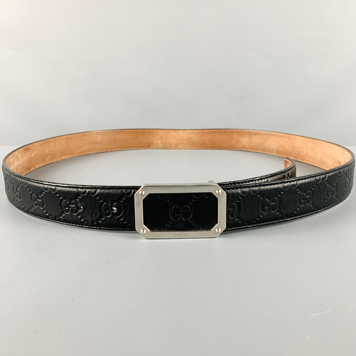 GUCCI Size 42 Black Silver Embossed Leather Belt