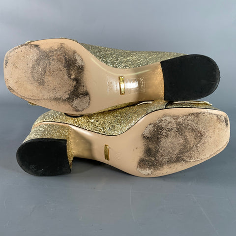 GUCCI Size 7.5 Metallic Gold Leather Textured Eyelash Fringed Pumps