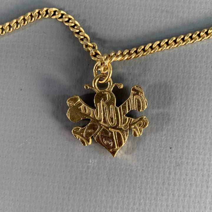 CHRISTIAN DIOR x STUSSY Gold Tone Skull Bee Pendant Necklace