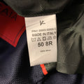 Close-up of care label reading Made in Italy, size 50 8R, and 100% Wool.