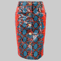 A red and blue snake embossed leather pencil skirt with gold tone metal buttons on a mannequin.