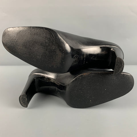 CHANEL Size 8 Black Leather Logo Classic Chunky Heel Pumps