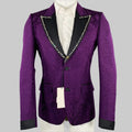 Purple patterned blazer with black trim on a mannequin against a gray background