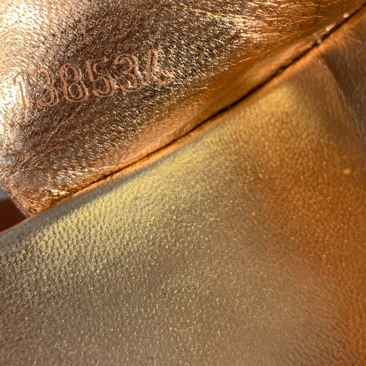 GUCCI Size 6.5 Gold Rose Metallic Ankle Strap Pumps