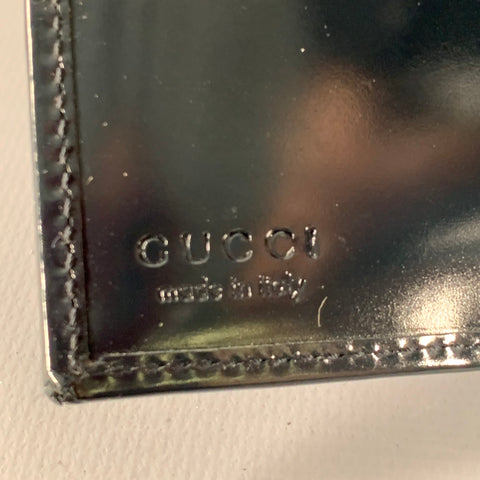 GUCCI Black Embossed Logo Patent Leather Wallet
