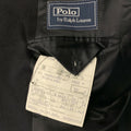 Interior view of Polo by Ralph Lauren label and garment production tag marked size 46 L.