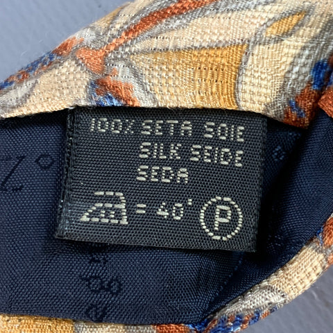 Cravate Ermenegildo Zegna en soie à motifs triangles abstraits beige et bleu