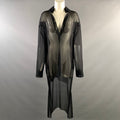 Front view of black sheer mesh Norma Kamali long tunic shirt on a mannequin with deep V-neck and long sleeves.