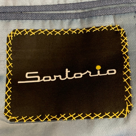 Costume Sartorio taille 44 régulier en laine bleue avec revers cranté