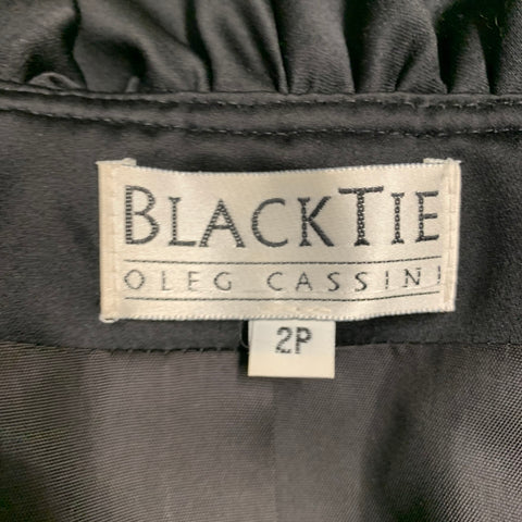 Veste Oleg Cassini taille 2 noire en polyester à col volanté