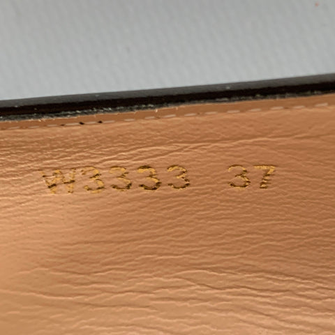 TOM FORD Mocassins plats à enfiler en cuir noir et doré avec chaîne, taille 7