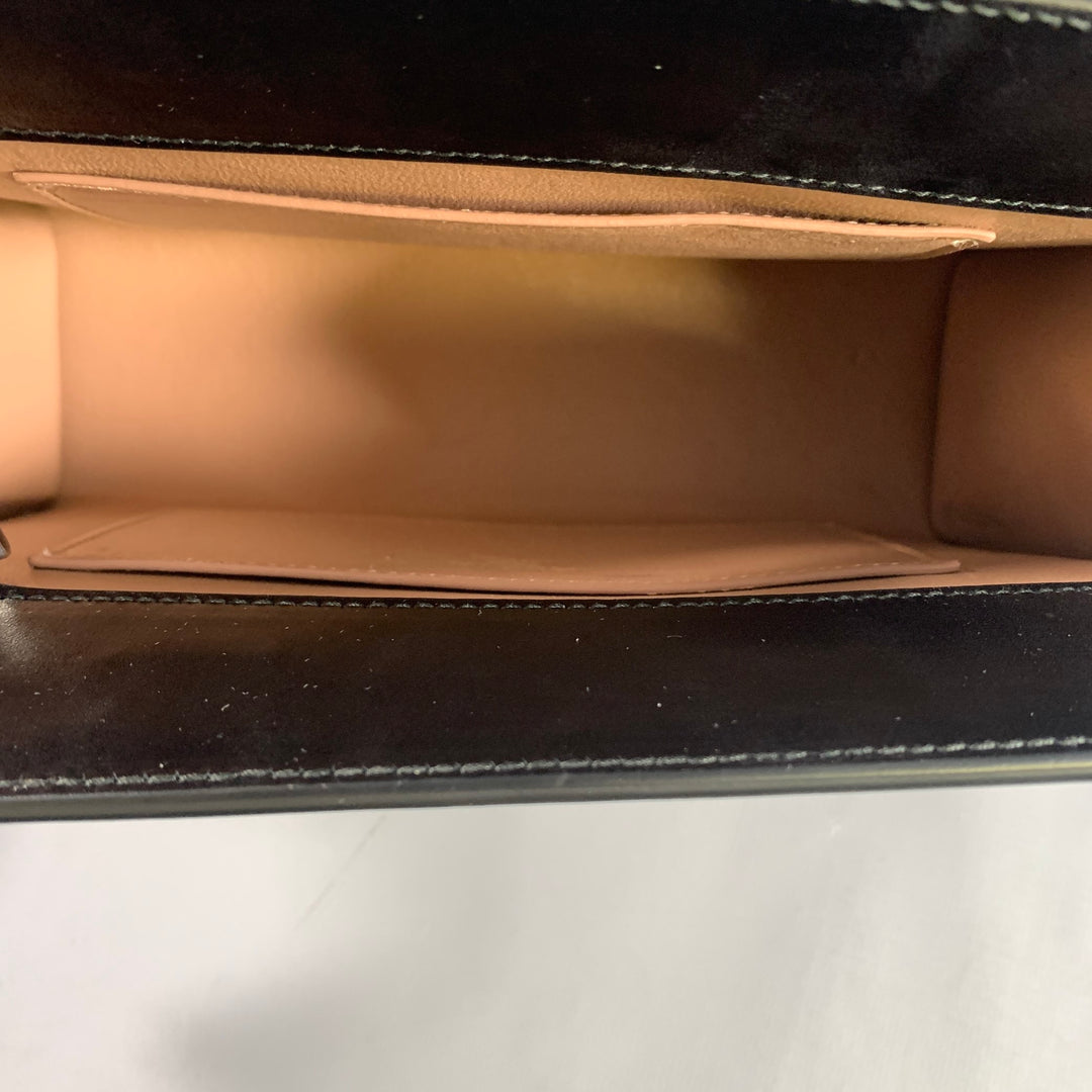ALAIA Black Silver Grommets Leather Clutch Handbag