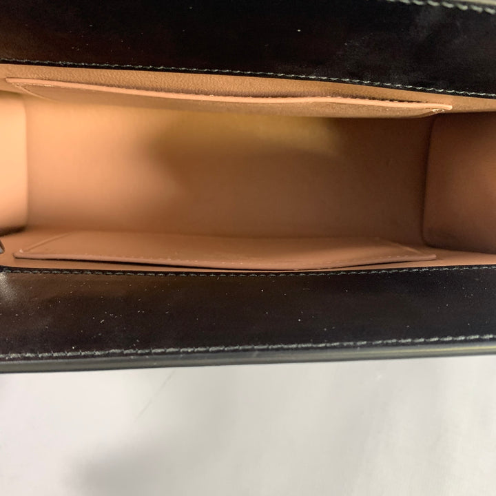ALAIA Black Silver Grommets Leather Clutch Handbag