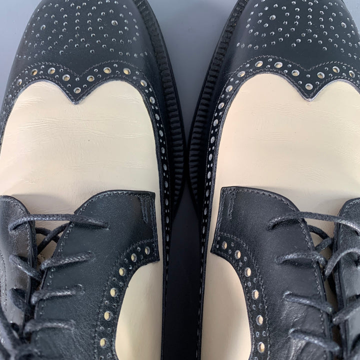 SALVATORE FERRAGAMO Size 9 Black Ivory Leather Spectator Wingtip Lace-Up Shoes
