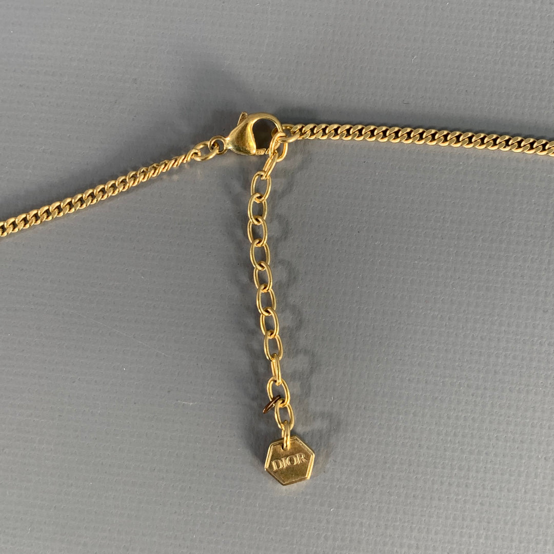 CHRISTIAN DIOR x STUSSY Gold Tone Skull Bee Pendant Necklace