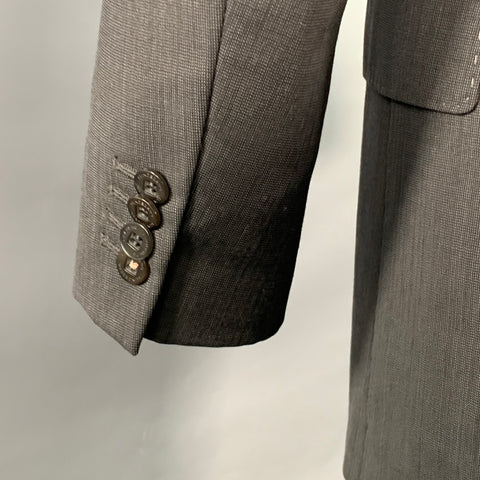 Costume J. LINDEBERG taille 40 coupe classique noir gris en laine, revers en pointe, un bouton