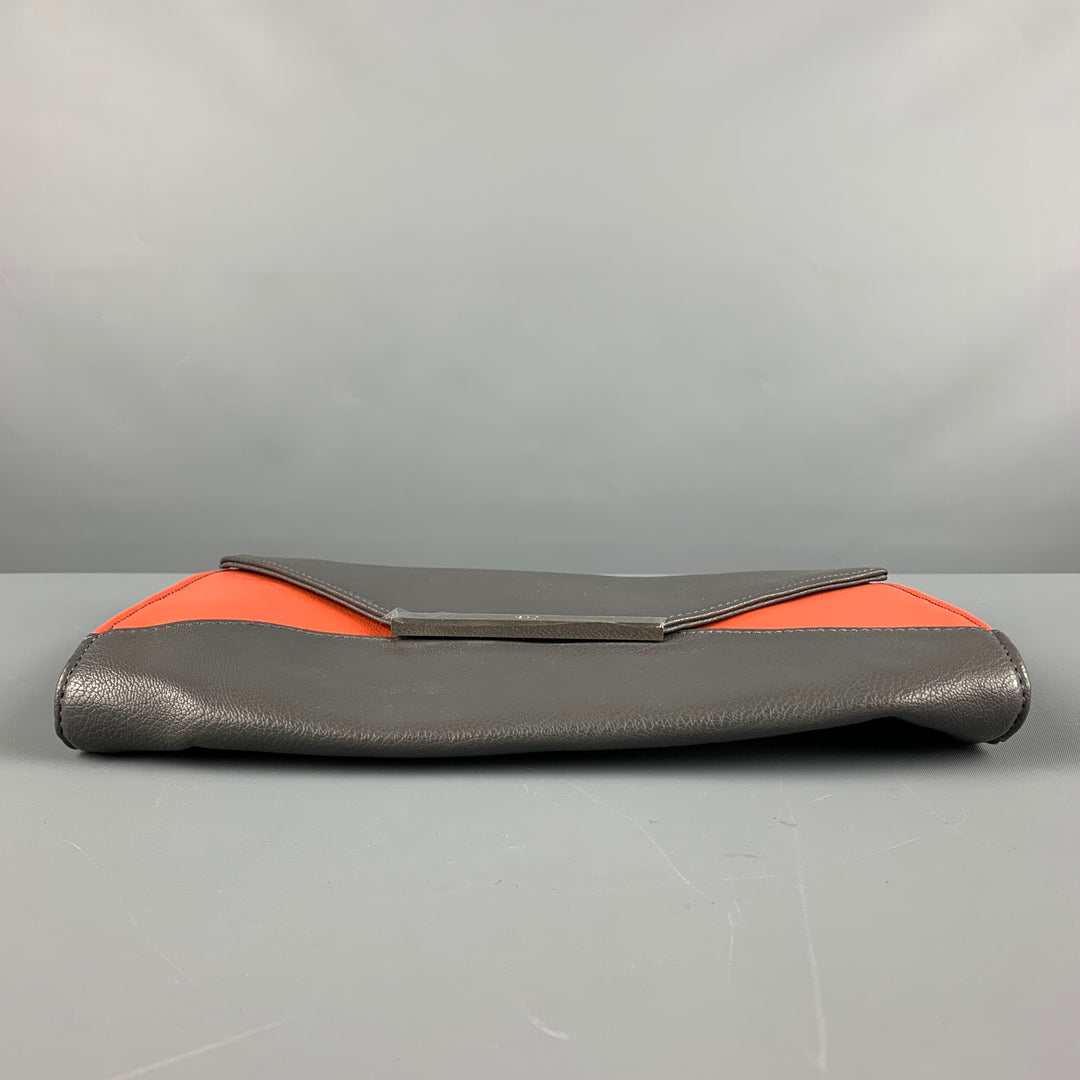 Bolso clutch con bloques de color gris naranja de R+J