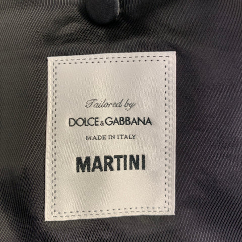 DOLCE & GABBANA Smoking noir en laine vierge et soie mélangées, revers en pointe, taille 48