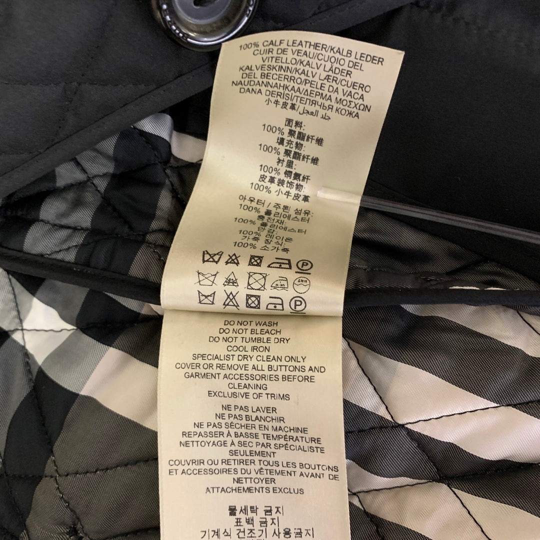 BURBERRY Size 2 Black Polyester Quilted Jacket.