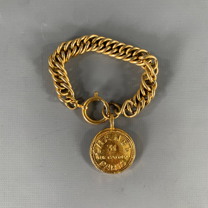 CHANEL Medallion 24k Gold Plated Charm Bracelet