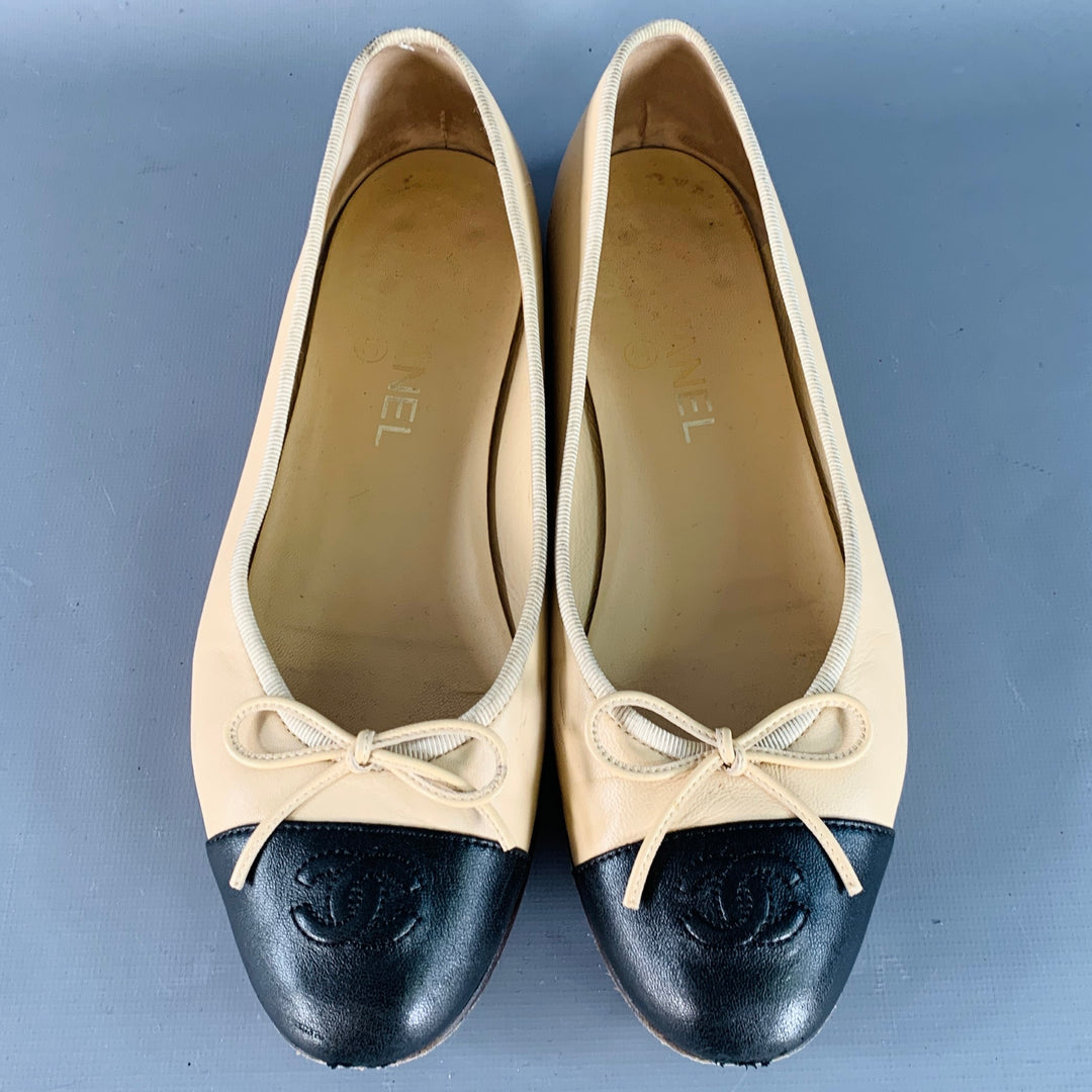 CHANEL Size 9 Beige Black Leather Monogram Cap Toe Flats