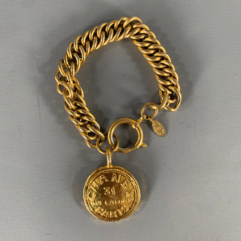 CHANEL Medallion 24k Gold Plated Charm Bracelet