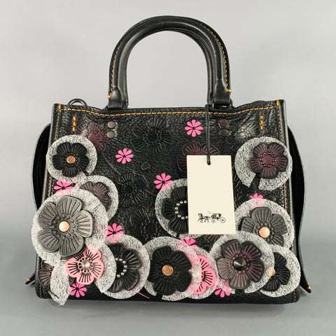 Sac à main en cuir noir COACH avec applique florale rose