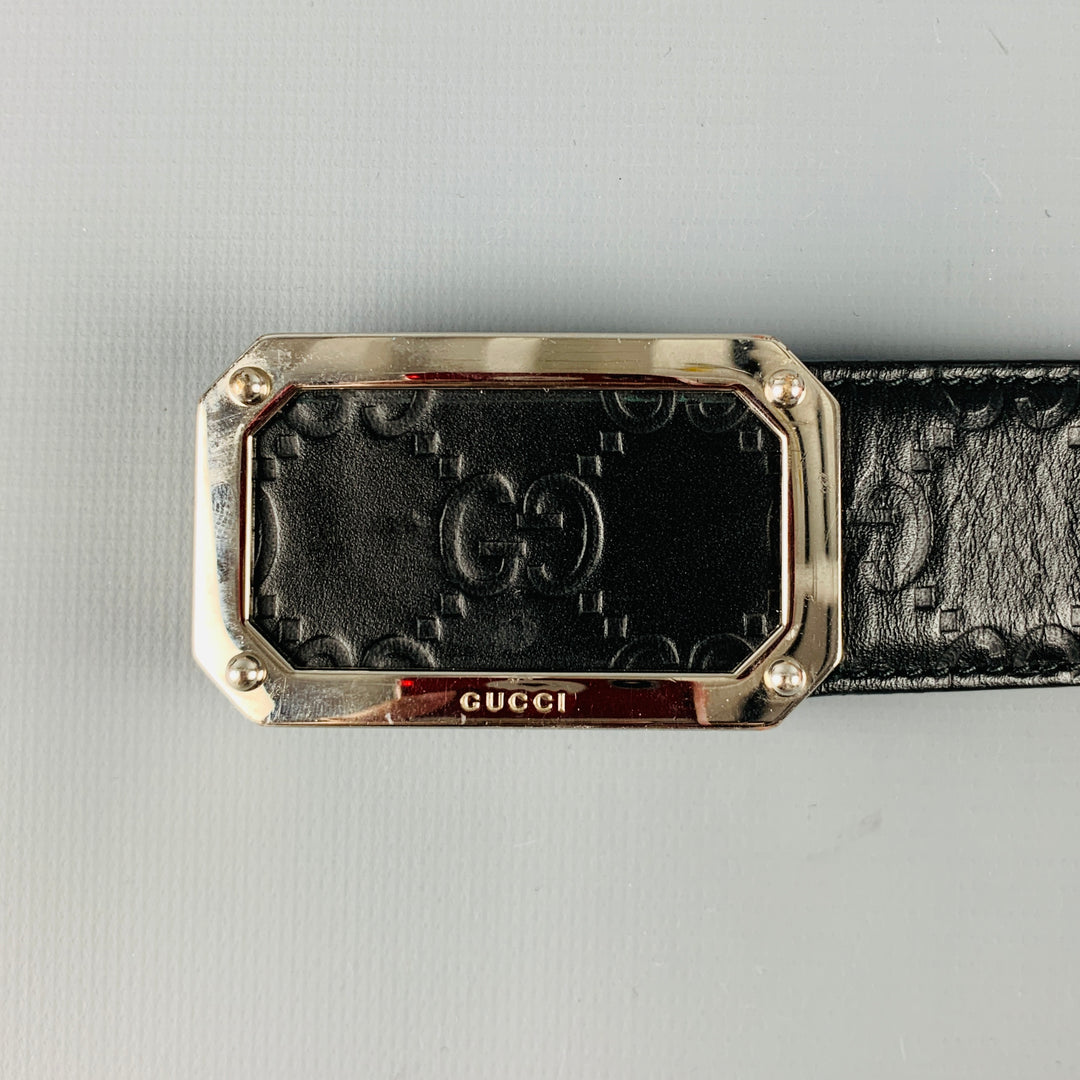 GUCCI Size 42 Black Silver Embossed Leather Belt