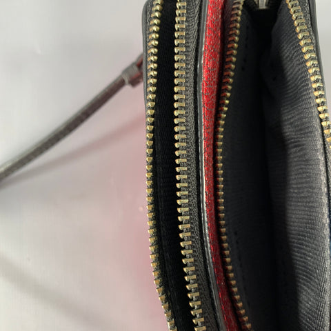 Portefeuille COACH zippé rouge et noir avec dragonne