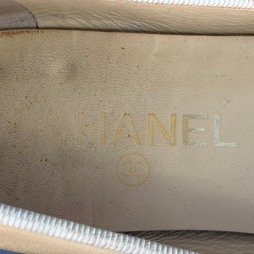 CHANEL Size 9 Beige Black Leather Monogram Cap Toe Flats