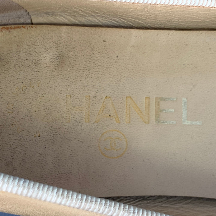 CHANEL Size 9 Beige Black Leather Monogram Cap Toe Flats