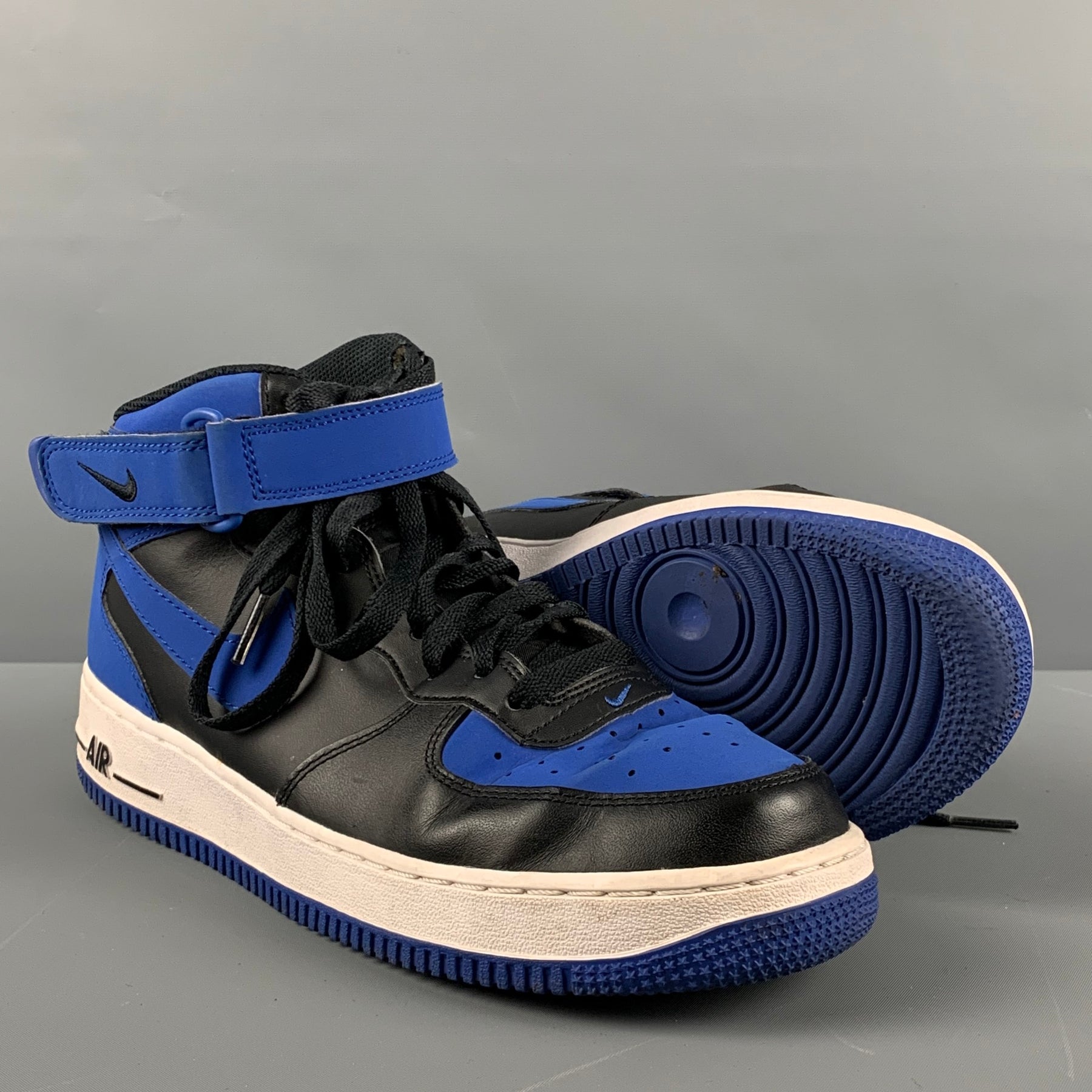 black and blue nikes high tops